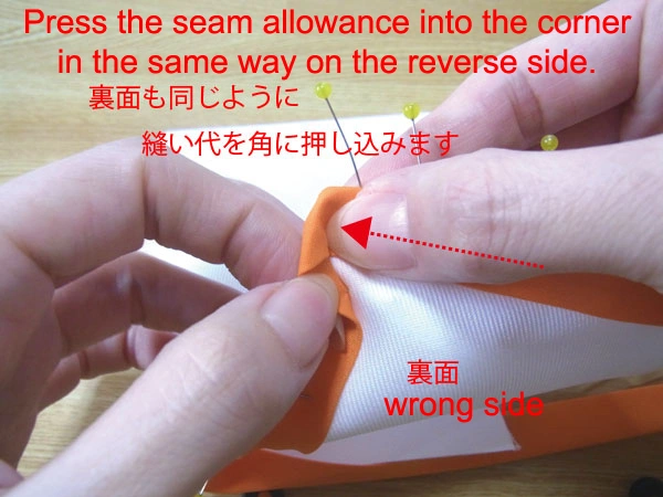 Turn fabric to treat bias tape on the back corners