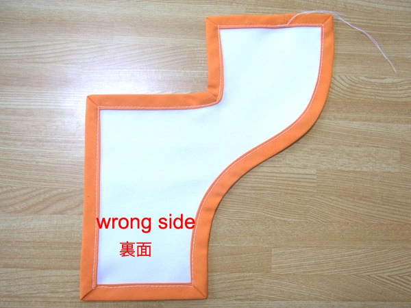 Checking stitches on the reverse side after bias tape sewing