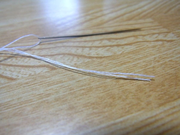 How to sew on buttons step by step with photos