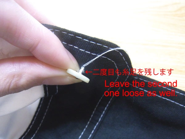 Securing the button with repeated stitches
