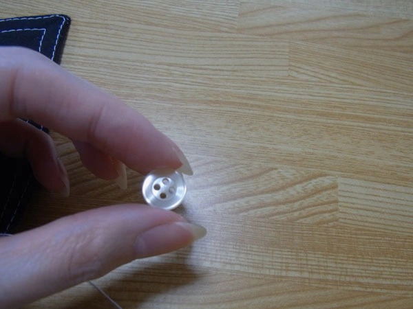 Four-hole button commonly used for shirts