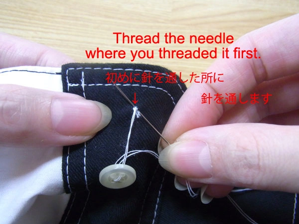 Sewing button onto collar stand