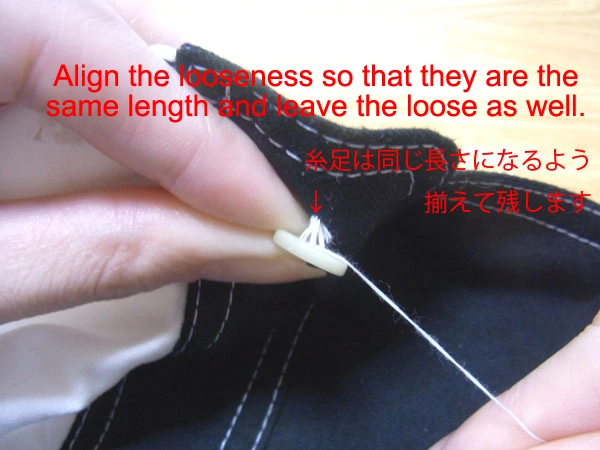 Keeping button taut while sewing thread foot