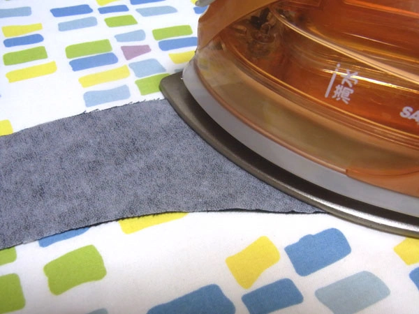 Lightweight fusible interlining for collar stand sewing