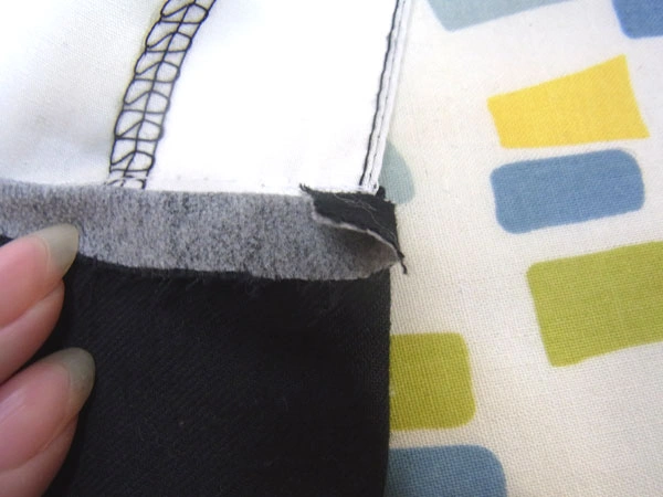 Ironing seam allowance upward for collar stand