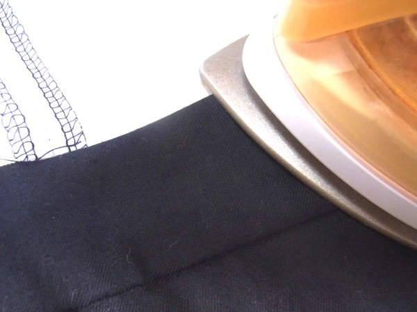 Ironing collar stand edge for a clean finish