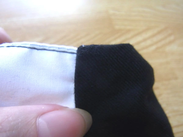 Trimming overlapping seam allowance on collar stand
