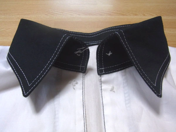 Topstitching collar stand for design and strength