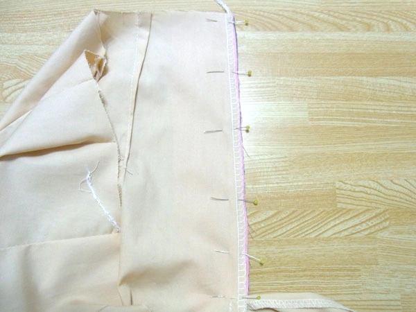 Match pants front with facing right side together