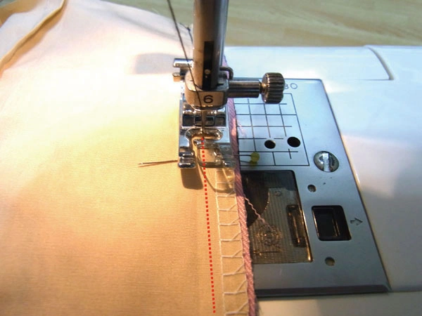 Sew 1cm from facing edge