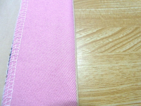 Fold shifted stitches inward when ironing