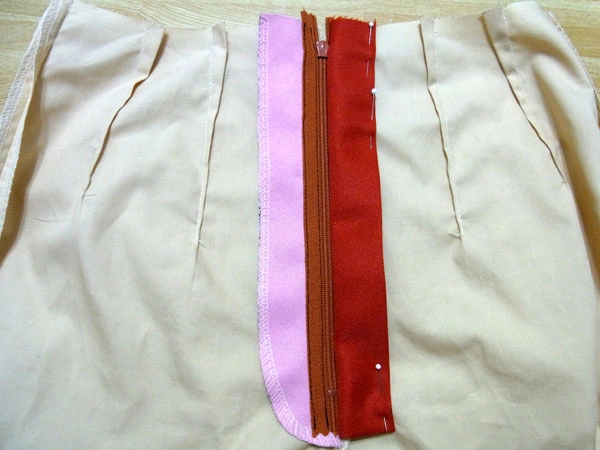 Facing side zipper sewn