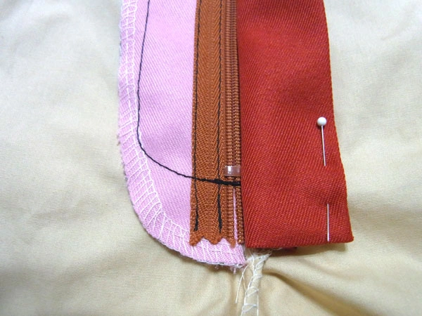 Zipper and facing securely in place