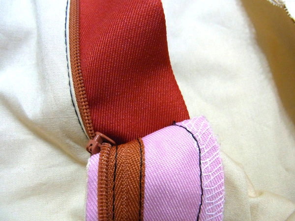 Bar tack stitch on seam line for reinforcement