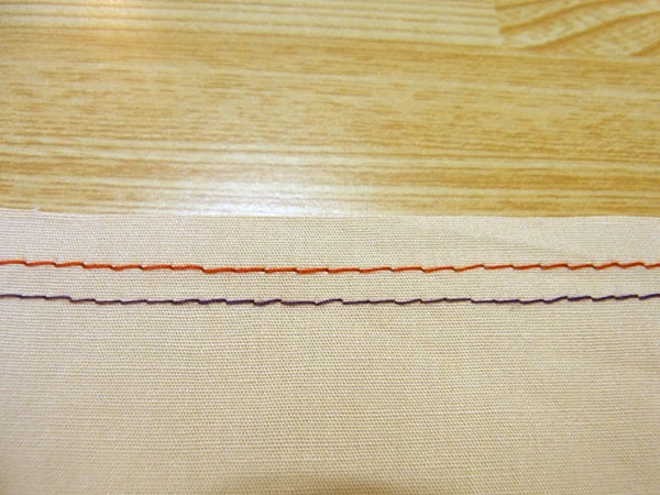 Sewing second gathering stitch 3mm below the first line