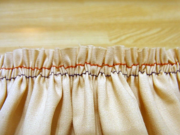 Close-up of two sewing lines creating stable gathers