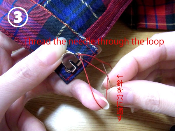 Passing needle through loop for half hitch