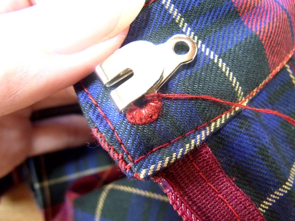 Hook sewing progress along waistband edge