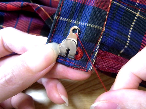 Threading needle through next hook hole