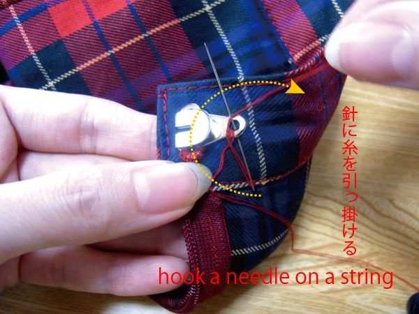 Hooking thread onto needle