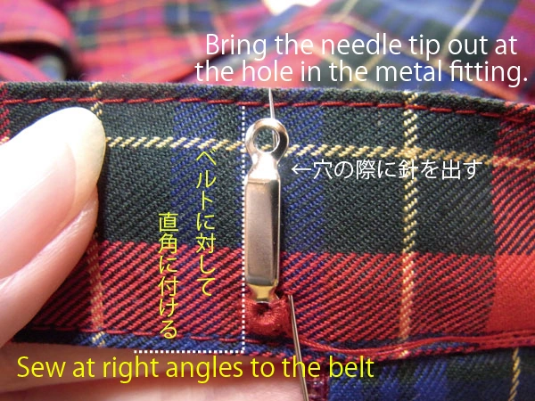 Needle emerging at other hole of bar eye