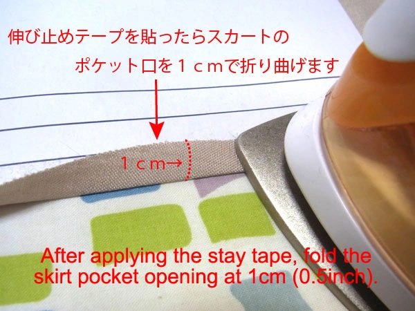 Applying stay tape to side pocket openings