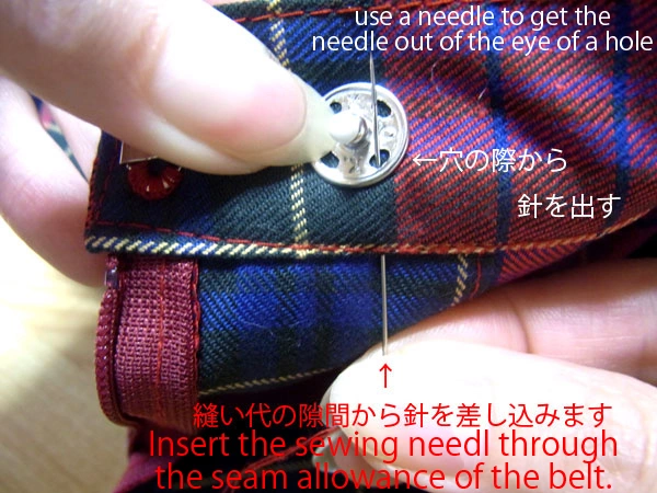 Inserting needle through belt cloth gap to hide knot