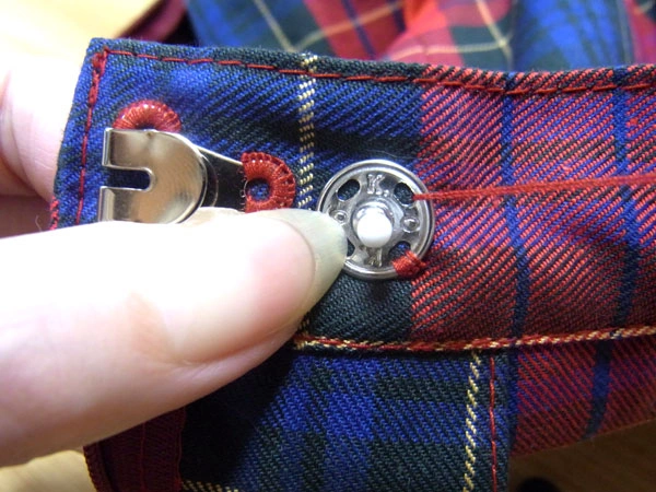 Needle passing through next snap hole