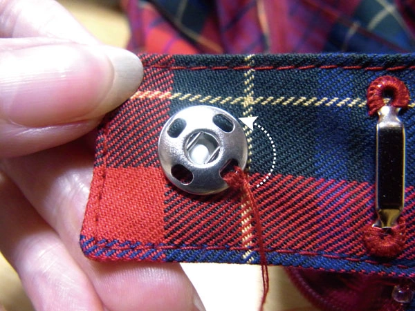 Sewing three stitches on female snap part