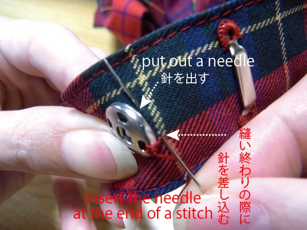 Needle passing through female snap part hole