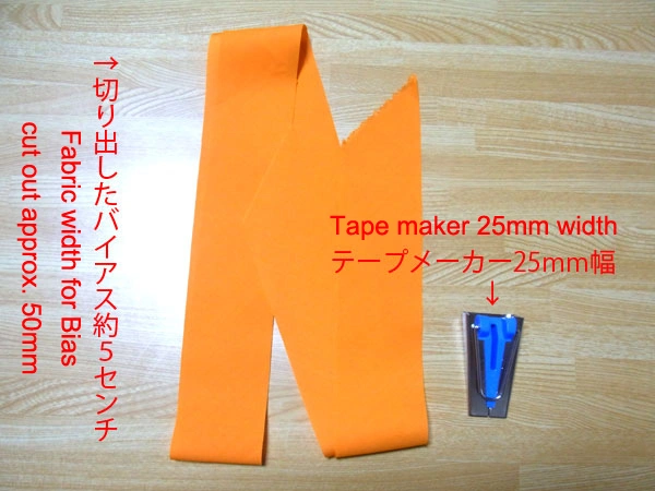 Cutting fabric for bias tape using a ruler and cutter