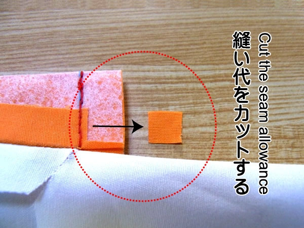 Trimming welt pocket seam allowance